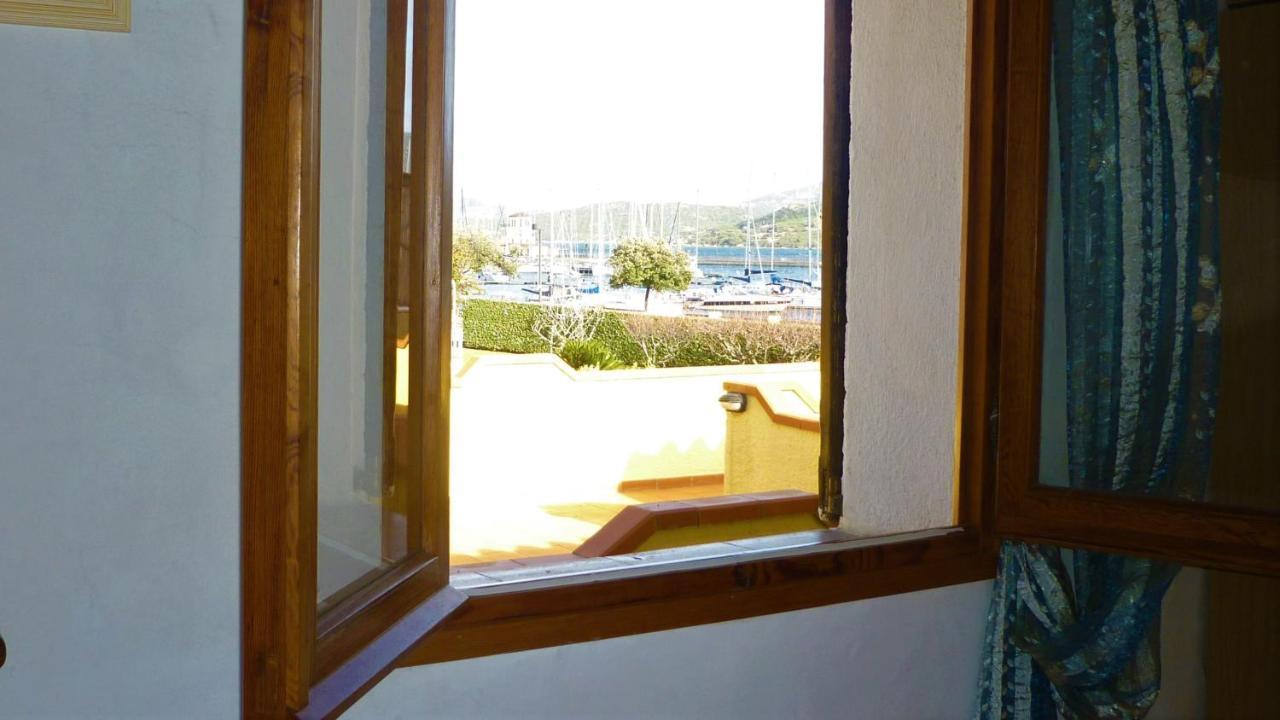 Approdo Apartment Cannigione Bagian luar foto